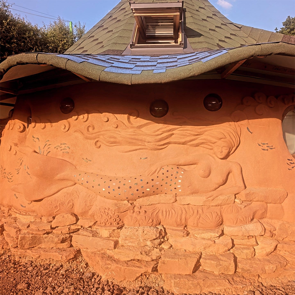 Mermaid Detail in Cob Glamping Pod at OTG