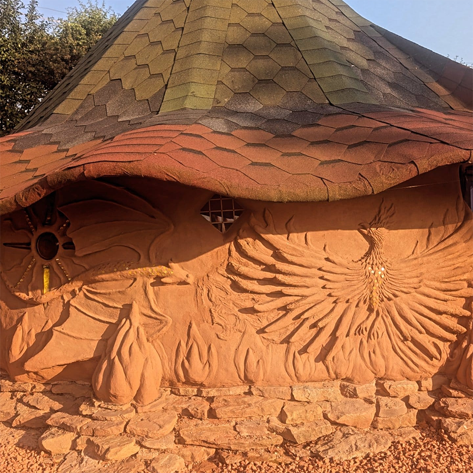 Outside of Fire Glamping Pod Showing The Phoenix detail